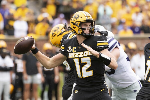 Missouri quarterback Brady Cook throws a pass during the first quarter of an NCAA college football game against Kansas State, Saturday, Sept. 16, 2023, in Columbia, Mo. (AP Photo/L.G. Patterson)