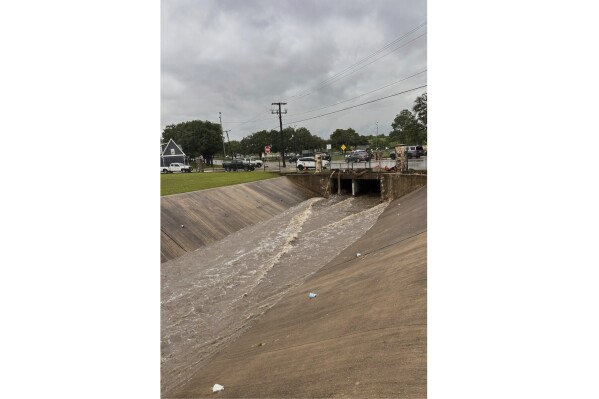 This photo provided by the City of Brenham shows a creek in Brenham, Texas, on Monday, May 5, 2025, where rescue crews searched for a missing 10-year-old girl who authorities say was swept away by rising waters.(Melinda Gordon/City of Brenham via AP)