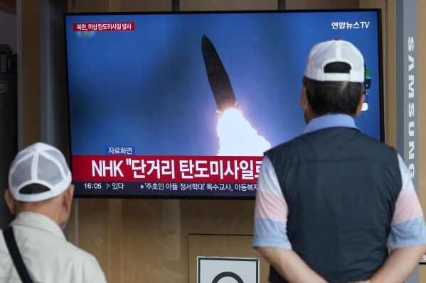 A TV screen shows a file image of North Korea's missile launch during a news program at the Seoul Railway Station in Seoul, South Korea, Friday, May 17, 2024. North Korea fired a ballistic missile off its east coast on Friday, South Korea's military said, a day after South Korea and the U.S. flew powerful fighter jets for a joint drill that the North views as a major security threat. (AP Photo/Ahn Young-joon)