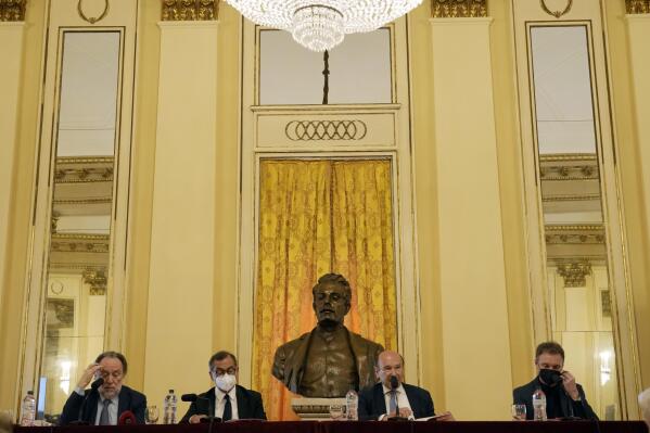 From left, La Scala director Riccardo Chailly, Milan's mayor Giuseppe Sala, La Scala general manager Dominique Meyer and La Scala ballet director Manuel Legris attend at a press conference to present the 2022/2023 season, at the Milan La Scala opera house, Italy, Monday, June 6, 2022. (AP Photo/Antonio Calanni)