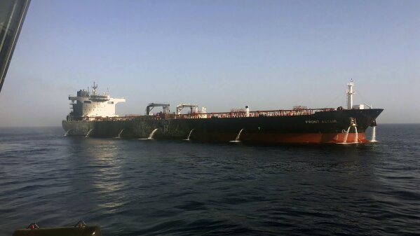 In this photo dated Thursday June 13, 2019, made available by the Norwegian shipowner Frontline, showing the crude oil tanker Front Altair after the fire aboard was extinguished onboard the Norwegian ship in the Gulf of Oman.  The U.S. Navy rushed to assist the stricken vessels in the Gulf of Oman, off the coast of Iran, as two oil tankers came under suspected attack amid heightened tension between Iran and the U.S. (Frontline via AP)