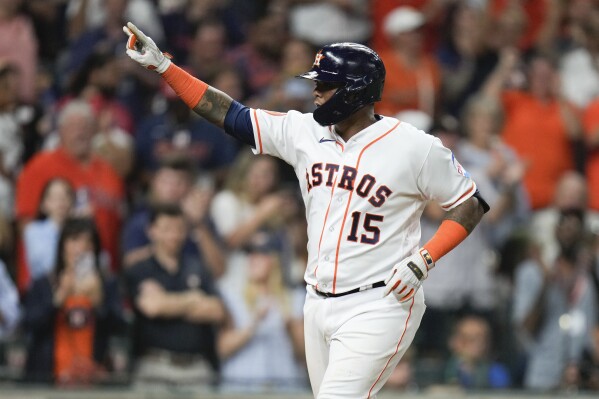 Houston Astros' Martin Maldonado celebrates his solo home run during the seventh inning of a baseball game against the Texas Rangers, Tuesday, July 25, 2023, in Houston. (AP Photo/Eric Christian Smith)