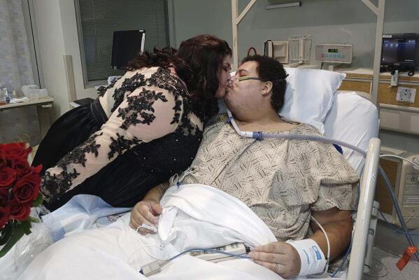 After long COVID battle, Iowa man decides to wed in hospital | AP News