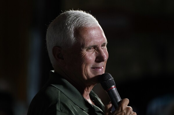 FILE - Republican presidential candidate former Vice President Mike Pence speaks at the Clinton County GOP Hog Roast, Sunday, July 30, 2023, in Clinton, Iowa. (AP Photo/Charlie Neibergall, File)