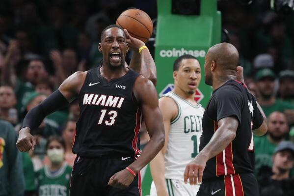 Miami Heat's Bam Adebayo (13) celebrates after scoring against the Boston Celtics during the second half of Game 3 of the NBA basketball playoffs Eastern Conference finals Saturday, May 21, 2022, in Boston. (AP Photo/Michael Dwyer)
