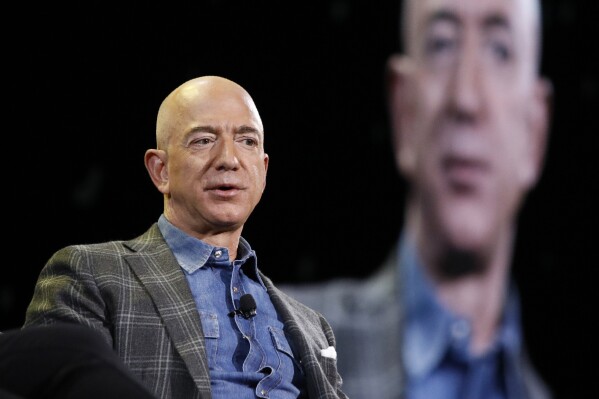 Jeff Bezos speaks at the Amazon re:MARS convention in Las Vegas, June 6, 2019. (AP Photo/John Locher, File)
