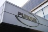 FILE - The logo of pharmaceutical giant Purdue Pharma is displayed outside its offices in Stamford, Conn., May 8, 2007.  OxyContin maker Purdue Pharma may begin executing a settlement that protects members of the Sackler family that owns the company from civil lawsuits.  of opioids, a court ruled Tuesday, July 25, 2023.  (AP Photo/Douglas Healey, File)