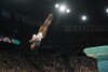 Simone Biles, of the United States, performs on the vault during the women's artistic gymnastics team finals round at Bercy Arena at the 2024 Summer Olympics, Tuesday, July 30, 2024, in Paris, France. (AP Photo/Charlie Riedel)
