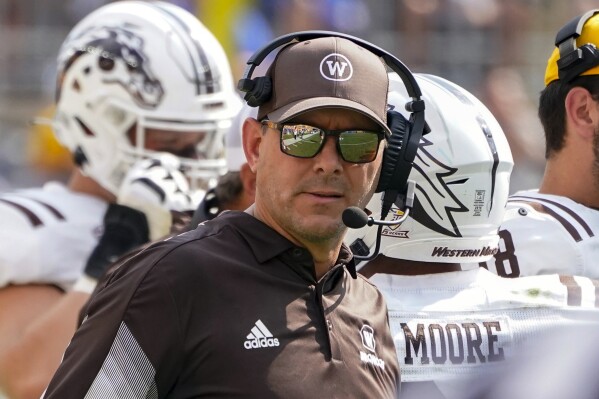 FILE - Western Michigan head coach Tim Lester watches as his team plays against Pittsburgh during the second half of an NCAA college football game, Saturday, Sept. 18, 2021, in Pittsburgh. Former Western Michigan coach Tim Lester has been hired to turn around Iowa's underperforming offense. His hiring was announced Wednesday, Jan. 31, 2024.(AP Photo/Keith Srakocic, File)