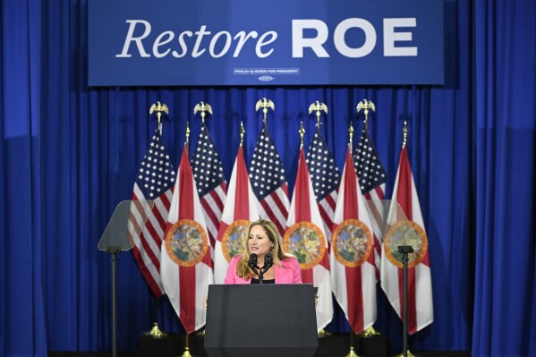 FILE - Former Rep. Debbie Mucarsel-Powell, a Democratic candidate for the U.S. Senate, addresses the crowd, April 23, 2024, in Tampa, Fla. Several Democrats running for the Senate this year say they support overriding the filibuster, which requires a 60-vote supermajority to pass legislation, to protect reproductive rights if their party retains control of the chamber. Mucarsel-Powell said she is "very much in favor of pausing the filibuster and voting for a woman's right to choose to codify Roe v. Wade," in an NBC News interview this month. (AP Photo/Phelan M. Ebenhack, File)
