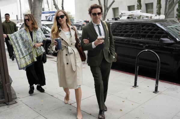 Danny Masterson and his wife Bijou Phillips arrive for closing arguments in his second trial, Tuesday, May 16, 2023, in Los Angeles. Masterson is charged with raping three women at his Los Angeles home between 2001 and 2003. (AP Photo/Chris Pizzello)