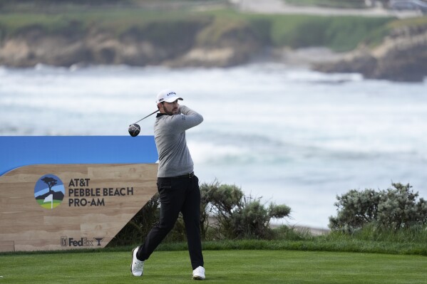 Patrick Cantlay hits from the fourth tee on the Spyglass Hill Golf Course during the first round of the AT&T Pebble Beach National Pro-Am golf tournament Thursday, Feb. 1, 2024, in Pebble Beach, Calif. (AP Photo/Eric Risberg)