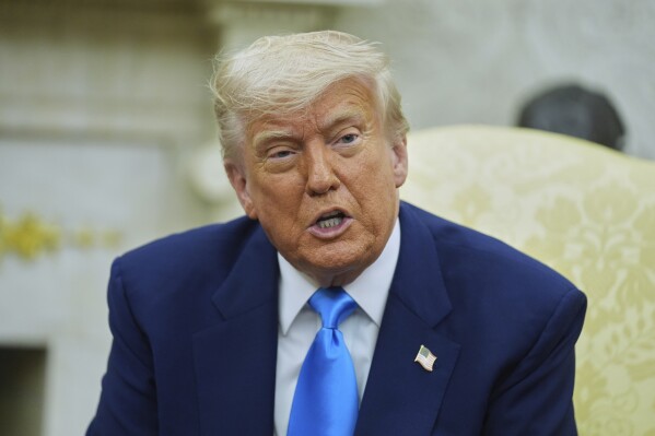President Donald Trump speaks when he meets South African President Cyril Ramaphosa in the Oval Office of the White House on Wednesday, May 21, 2025. (AP Photo/Evan Vucci)