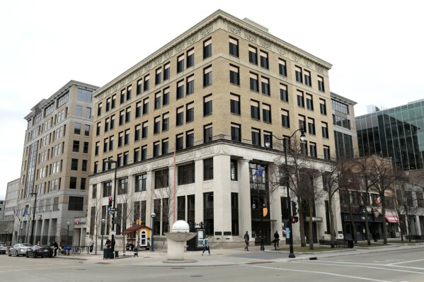 
              Foxconn Technology Group announced Friday, April 12, 2019, that it will soon buy a six-story office building, center, at 1 W. Main St. on the Capitol square in Madison, Wis. It will serve as one of the company's statewide "innovation centers" and link the Taiwanese electronics firm to UW-Madison.  (Steve Apps/Wisconsin State Journal via AP)
            