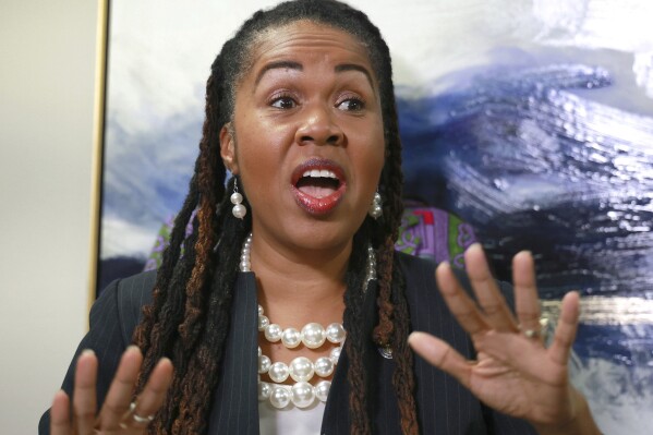 Suspended state attorney Monique Worrell from the Ninth Judicial Circuit answers a question at a press conference in Orlando, Fla., Thursday, Sept. 7, 2023. Worrell is suing Florida governor Ron DeSantis, filing a lawsuit Wednesday seeking to have the Florida Supreme Court overturn the suspension. (Joe Burbank/Orlando Sentinel via AP)