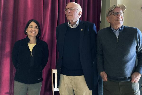 Becca Balint, left, a Democratic candidate for the U.S. House for Vermont, stands with Sen. Bernie Sanders, I-Vt., center, and Rep. Peter Welch, D-Vt., on Oct. 22, 2022, at a campaign rally in Barre, Vt. (AP Photo/Lisa Rathke)