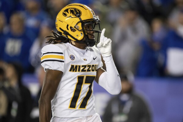 Missouri wide receiver Marquis Johnson gestures to the crowd after a touchdown against Kentucky during the first half of an NCAA college football game in Lexington, Ky., Saturday, Oct. 14, 2023. (AP Photo/Michelle Haas Hutchins)