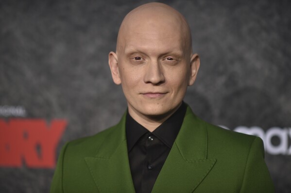 Anthony Carrigan arrives at the season four premiere of 