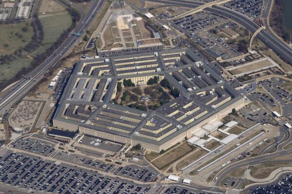 FILE - The Pentagon is seen from Air Force One as it flies over Washington, March 2, 2022. A new Pentagon office set up to track reports of unidentified flying objects has received “several hundreds” of new reports, but no evidence so far of alien life. That's according to the leadership of the All-domain Anomaly Resolution Office. (AP Photo/Patrick Semansky, File)