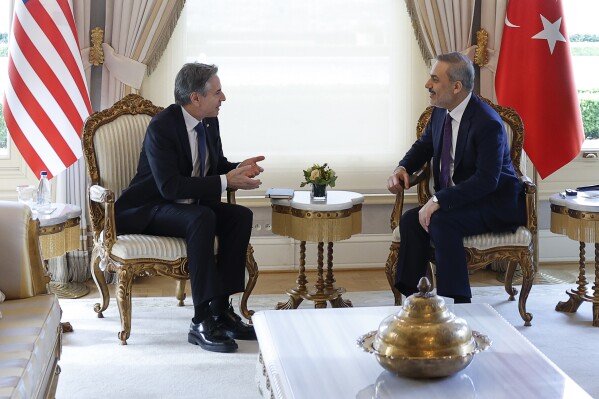 U.S. Secretary of State Antony Blinken, left, meets with Turkish Foreign Minister Hakan Fidan at Vahdettin, a private residence of the Presidency, in Istanbul, Turkey, Saturday, Jan. 6, 2024. (Evelyn Hockstein/Pool Photo via AP)