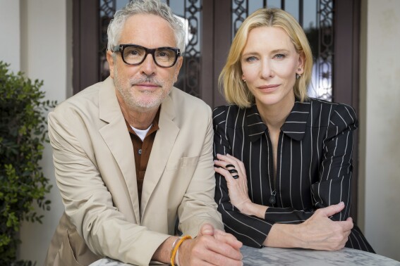 Director Alfonso Cuaron, left, and Cate Blanchett pose for portraits to promote the Apple TV series "Disclaimer" during the 81st edition of the Venice Film Festival in Venice, Italy, on Friday, Aug. 30, 2024. (Photo by Vianney Le Caer/Invision/AP)
