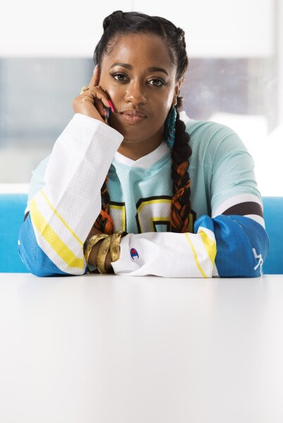 FILE - This Aug. 22, 2019 photo shows Rapsody posing for a portrait in New York. Rapsody's “Pray Momma Don’t Cry” is one of four songs featured on “I Can’t Breath/Music for the Movement,” a four-song album that is a joint venture between Disney Music Group and The Undefeated, ESPN’s platform for exploring the intersections of race, sports and culture. Rapsody is hoping the album can unite people.  (Photo by Brian Ach/Invision/AP, File)