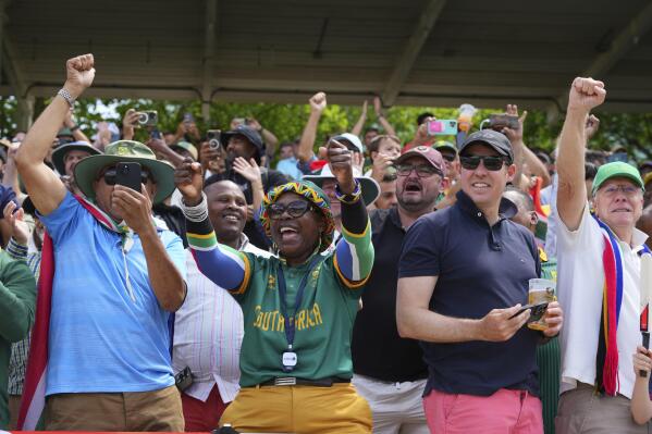 South African fans react after their team's win in the World Test Championship final against Australia at Lord's cricket ground in London, Saturday, June 14, 2025. (AP Photo/Kirsty Wigglesworth)