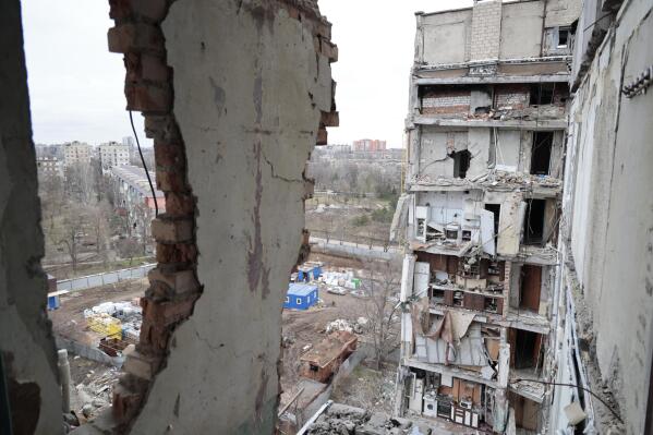 A view of an apartment building, damaged during a heavy fighting, in Mariupol, in Russian-controlled Donetsk region, eastern Ukraine, Thursday, Jan. 5, 2023. (AP Photo/Alexei Alexandrov)