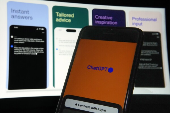 FILE - OpenAI's ChatGPT app is displayed on an iPhone in New York, May 18, 2023. With companies deploying artificial intelligence to every corner of society, state lawmakers are playing catch-up with the first major proposals to reign in AI's penchant for discrimination — but those bills face blistering headwinds from every direction. (AP Photo/Richard Drew, File)