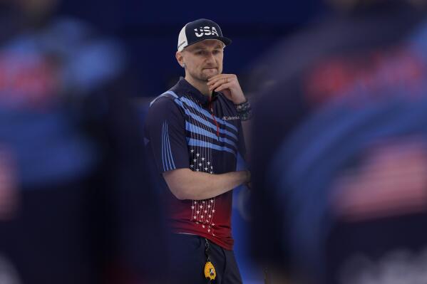 United States' Colin Hufman waits to compete during a men's curling match against Canada at the Beijing Winter Olympics Sunday, Feb. 13, 2022, in Beijing. (AP Photo/Brynn Anderson)