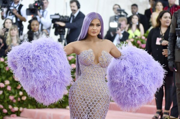 FILE - In this May 6, 2019 file photo, Kylie Jenner attends The Metropolitan Museum of Art's Costume Institute benefit gala celebrating the opening of the "Camp: Notes on Fashion" exhibition in New York. Jenner has been hospitalized with an undisclosed illness and will have to skip a planned cosmetics rollout at Paris Fashion Week. The 22-year-old social media star and makeup mogul said on Twitter Wednesday, Sept. 25, 2019, that she's "really sick and unable to travel." (Photo by Charles Sykes/Invision/AP, File)