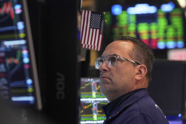 Specialist Anthony Matesic works at his post on the floor of the New York Stock Exchange, Wednesday, May 7, 2025. (AP Photo/Richard Drew)