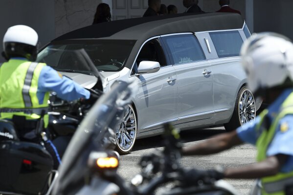 
              A hearse carrying the casket of film director John Singleton leaves Angelus Funeral Home, Monday, May 6, 2019, after a memorial service in Los Angeles. Singleton died on April 29 following a stroke. (AP Photo/Chris Pizzello)
            