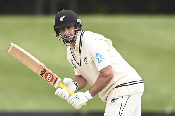 FILE - New Zealand's Colin de Grandhomme bats during play on day three of the second cricket test between South Africa and New Zealand at Hagley Oval in Christchurch, New Zealand on Feb. 27, 2022. New Zealand allrounder Colin de Grandhomme announced his retirement from international cricket on Wednesday after being surprisingly recruited to play for the Adelaide Strikers in Australia’s Big Bash Twenty20 league. (Andrew Cornaga/Photosport via AP, File)