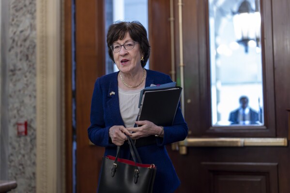 Sen. Susan Collins, R-Maine, arrives as Republicans hold a closed-door meeting after blocking a bipartisan border package that had been tied to wartime aid for Ukraine, at the Capitol in Washington, Thursday, Feb. 8, 2024. (AP Photo/J. Scott Applewhite)