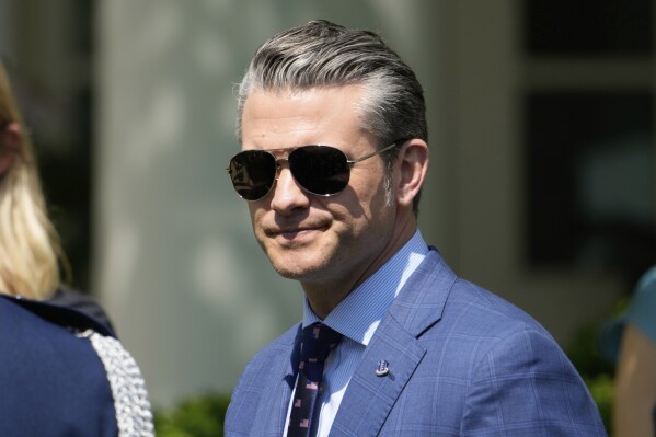 Secretary of Defense Pete Hegseth arrives for a National Day of Prayer event in the Rose Garden of the White House, Thursday, May 1, 2025, in Washington. (AP Photo/Alex Brandon)