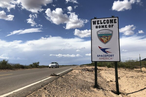 FILE - This Aug. 15, 2019, file photo shows the road to Spaceport America near Upham, New Mexico. An investigation into the conduct of Spaceport America's chief executive officer is ongoing and initial findings are expected in the coming weeks, the organization's interim leader said Wednesday, Sept. 2, 2020. (AP Photo/Susan Montoya Bryan, File)