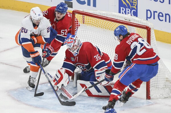 Josh Anderson scores twice lifting Canadiens to 5-3 win over Islanders | AP  News