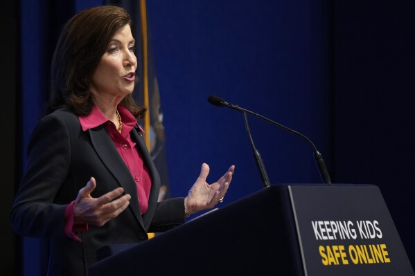New York Gov. Kathy Hochul speaks during a news conference in New York, Wednesday, Oct. 11, 2023. New York is bidding to put new controls on social media platforms that state leaders say will protect the mental health of younger users. (AP Photo/Seth Wenig)