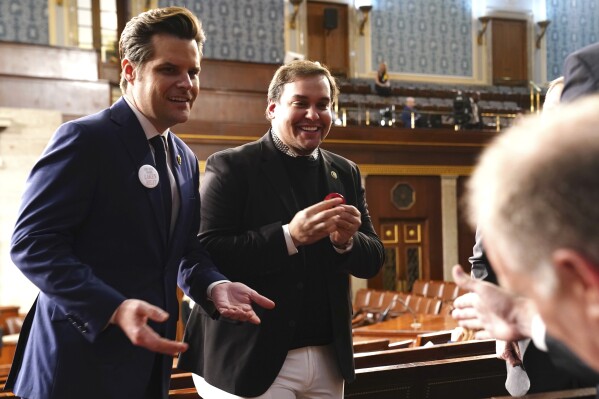 Rep. Matt Gaetz, R-Fla., left, and former Rep. George Santos, R-N.Y., talk before President Joe Biden delivers the State of the Union address to a joint session of Congress at the Capitol, Thursday, March 7, 2024, in Washington. (Shawn Thew/Pool via AP)