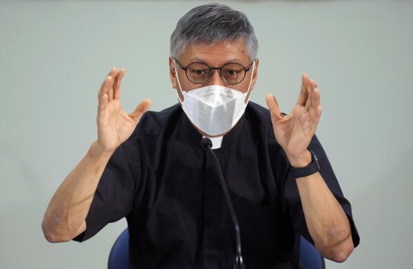 Stephen Chow Sau-yan gestures during a press conference in Hong Kong Tuesday, May 18, 2021. Pope Francis on Monday named a new bishop for Hong Kong, tapping the head of his own Jesuit order in the region, the Rev. P. Stephen Chow Sau-Yan, for the politically sensitive position that has been vacant for two years. (AP Photo/Vincent Yu)