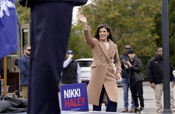 Republican presidential candidate former UN Ambassador Nikki Haley walks to the stage at a campaign event after being introduced by U.S. Rep. Ralph Norman, R-S.C., on Monday, Feb. 19, 2024, in Camden, S.C. Haley has sharpened her attacks on former President Donald Trump, the GOP front-runner, as the two prepare to face off in South Carolina's Republican primary on Feb. 24. (AP Photo/Meg Kinnard)