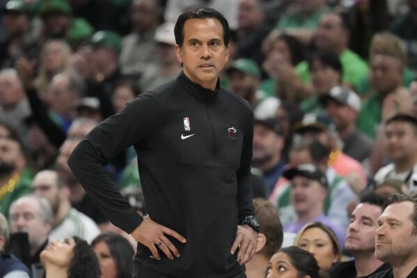 Miami Heat head coach Erik Spoelstra watches from the bench in the first half of Game 1 of the NBA basketball Eastern Conference finals playoff series against the Boston Celtics in Boston, Wednesday, May 17, 2023. (AP Photo/Charles Krupa)