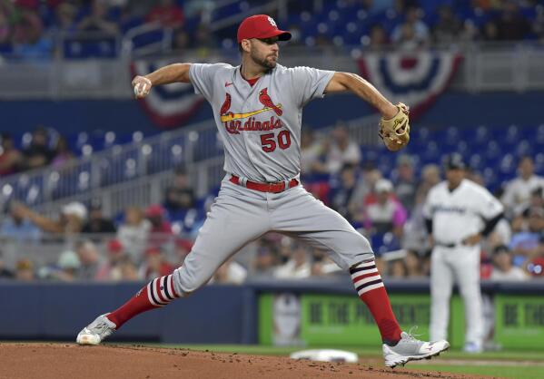 Pujols paces Cardinals, helps Wainwright in win over Marlins