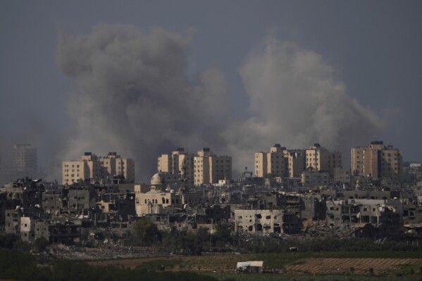 Smoke rises following an Israeli airstrike in the Gaza Strip, as seen from southern Israel, Wednesday, Oct. 18, 2023. (AP Photo/Francisco Seco)