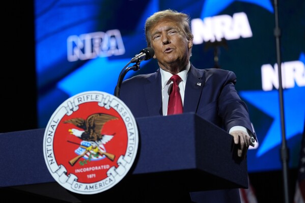 Republican presidential candidate former President Donald Trump speaks at the National Rifle Association's Presidential Forum in Harrisburg, Pa., Friday, Feb. 9, 2024. (AP Photo/Matt Rourke)