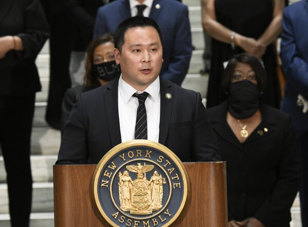 FILE - In this June 8, 2020, file photo, Assemblyman Ron Kim, D-Queens, speaks during a press briefing at the state Capitol in Albany, N.Y. Kim says Gov. Andrew Cuomo vowed to "destroy" him, during a private phone call last week for criticizing his handling of COVID-19 outbreaks at nursing homes. (AP Photo/Hans Pennink, File)