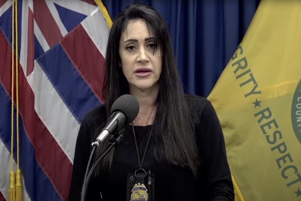 In this image made from video provided by the Honolulu Police Department, Lt. Deena Thoemmes speaks during a news conference on Friday, Feb. 9, 2024, in Honolulu, Hawaii. A 10-year-old girl found dead at home in Hawaii last month died from prolonged abuse, pneumonia and starvation, police said Friday. (Honolulu Police Department via AP)