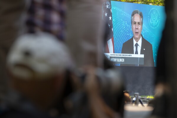 U.S. Secretary of State Antony Blinken remotely addressing the participants in the observances of the anniversary of the Aug. 16, 1943 Jewish ghetto uprising in Bialystok, Poland, on Wednesday, Aug. 16, 2023. Participating was Blinken's mother, Judith Pisar, the widow of a Bialystok ghetto survivor Samuel Pisar, who was Blinken's stepfather. U.S. Ambassador to Poland Mark Brzezinski also attended. (AP Photo)