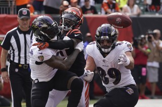 Cincinnati Bengals cornerback Cam Taylor-Britt, center, breaks up a pass intended for Baltimore Ravens wide receiver Odell Beckham Jr., left, as Ravens tight end Mark Andrews (89) gets in on the play during the first half of an NFL football game Sunday, Sept. 17, 2023, in Cincinnati. (AP Photo/Darron Cummings)